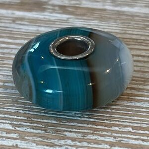 Trollbeads Turquoise Striped Agate gemstone bead with a sterling silver core